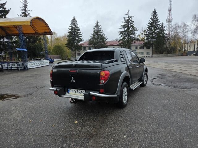 Чорний Міцубісі Л 200, об'ємом двигуна 2.5 л та пробігом 302 тис. км за 12500 $, фото 6 на Automoto.ua
