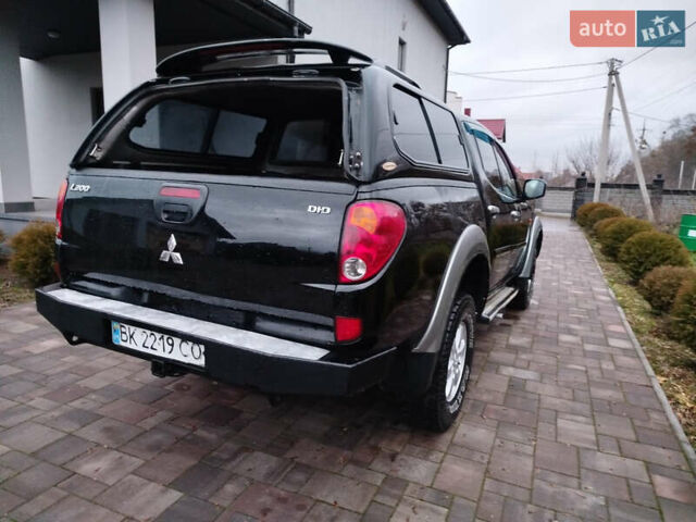 Чорний Міцубісі Л 200, об'ємом двигуна 2.48 л та пробігом 219 тис. км за 10500 $, фото 3 на Automoto.ua