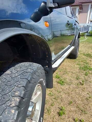 Черный Мицубиси Л 200, объемом двигателя 2.48 л и пробегом 392 тыс. км за 15500 $, фото 3 на Automoto.ua