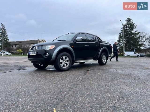 Чорний Міцубісі Л 200, об'ємом двигуна 2.48 л та пробігом 302 тис. км за 12500 $, фото 7 на Automoto.ua