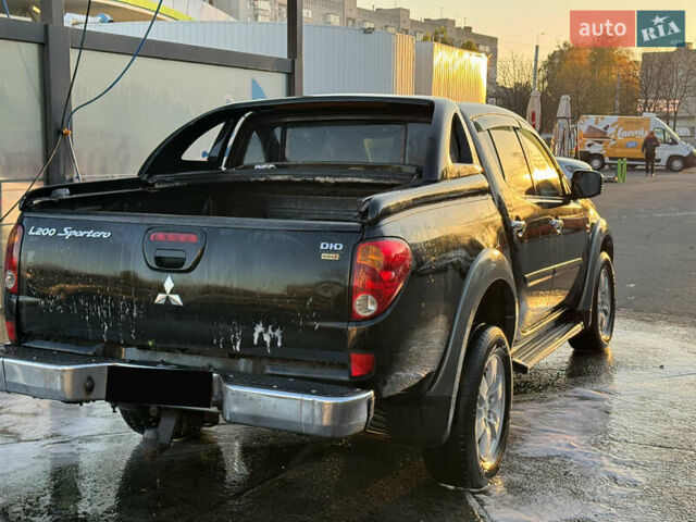 Чорний Міцубісі Л 200, об'ємом двигуна 2.5 л та пробігом 302 тис. км за 10500 $, фото 13 на Automoto.ua