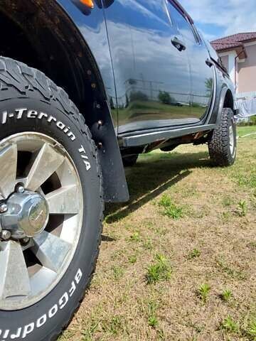 Черный Мицубиси Л 200, объемом двигателя 2.48 л и пробегом 392 тыс. км за 15500 $, фото 12 на Automoto.ua