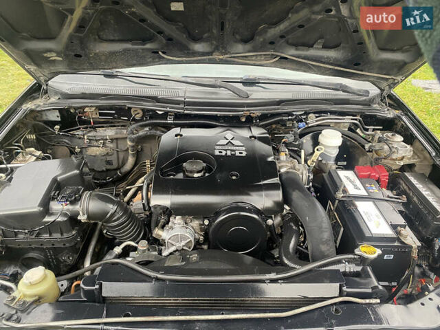 Черный Мицубиси Л 200, объемом двигателя 0 л и пробегом 400 тыс. км за 8500 $, фото 10 на Automoto.ua