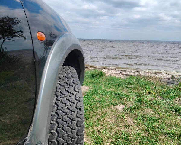 Чорний Міцубісі Л 200, об'ємом двигуна 2.48 л та пробігом 330 тис. км за 11800 $, фото 6 на Automoto.ua