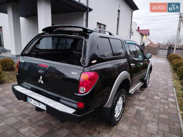 Чорний Міцубісі Л 200, об'ємом двигуна 2.48 л та пробігом 219 тис. км за 10500 $, фото 4 на Automoto.ua