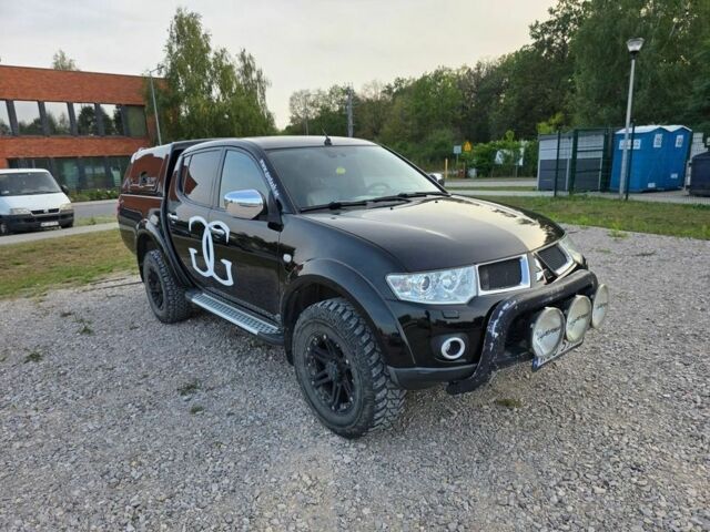 Черный Мицубиси Л 200, объемом двигателя 2.5 л и пробегом 213 тыс. км за 3006 $, фото 2 на Automoto.ua