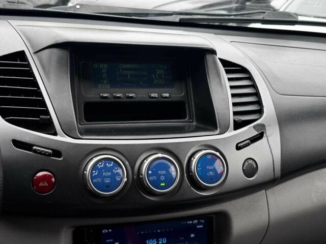 Чорний Міцубісі Л 200, об'ємом двигуна 2.5 л та пробігом 330 тис. км за 9890 $, фото 15 на Automoto.ua