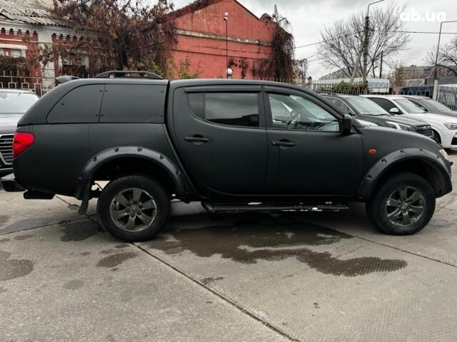 Чорний Міцубісі Л 200, об'ємом двигуна 2.5 л та пробігом 330 тис. км за 9890 $, фото 6 на Automoto.ua