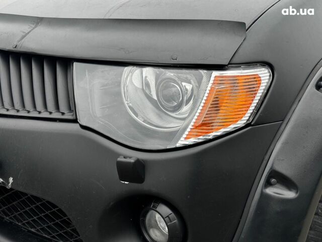 Чорний Міцубісі Л 200, об'ємом двигуна 2.5 л та пробігом 330 тис. км за 9890 $, фото 8 на Automoto.ua