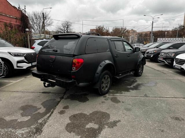 Чорний Міцубісі Л 200, об'ємом двигуна 2.5 л та пробігом 330 тис. км за 9890 $, фото 5 на Automoto.ua