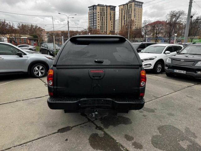 Чорний Міцубісі Л 200, об'ємом двигуна 2.5 л та пробігом 330 тис. км за 9890 $, фото 4 на Automoto.ua