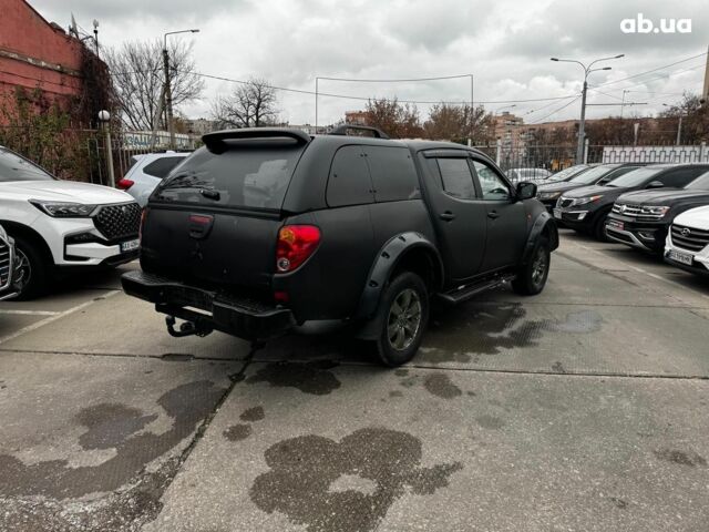 Чорний Міцубісі Л 200, об'ємом двигуна 2.5 л та пробігом 330 тис. км за 9890 $, фото 5 на Automoto.ua