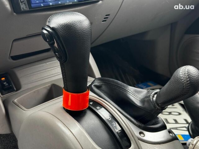 Чорний Міцубісі Л 200, об'ємом двигуна 2.5 л та пробігом 330 тис. км за 9890 $, фото 12 на Automoto.ua