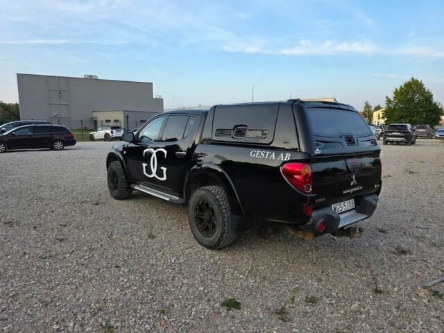 Черный Мицубиси Л 200, объемом двигателя 2.5 л и пробегом 213 тыс. км за 3006 $, фото 5 на Automoto.ua