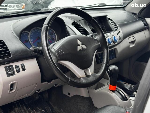 Чорний Міцубісі Л 200, об'ємом двигуна 2.5 л та пробігом 330 тис. км за 9890 $, фото 11 на Automoto.ua