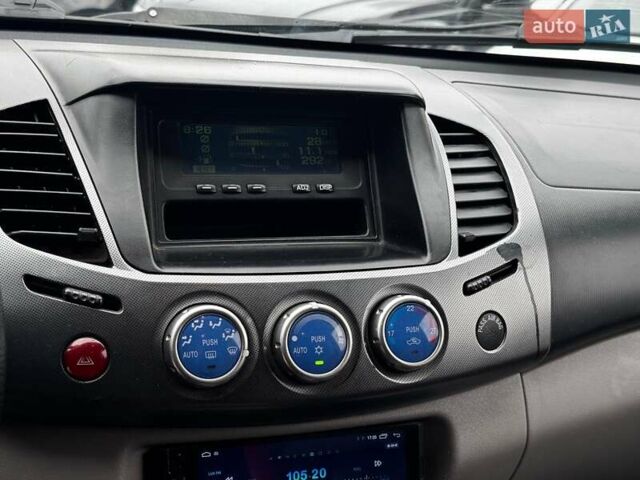 Черный Мицубиси Л 200, объемом двигателя 2.5 л и пробегом 330 тыс. км за 9890 $, фото 15 на Automoto.ua