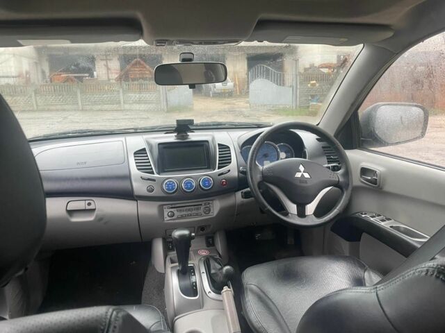 Черный Мицубиси Л 200, объемом двигателя 2.5 л и пробегом 145 тыс. км за 6800 $, фото 15 на Automoto.ua