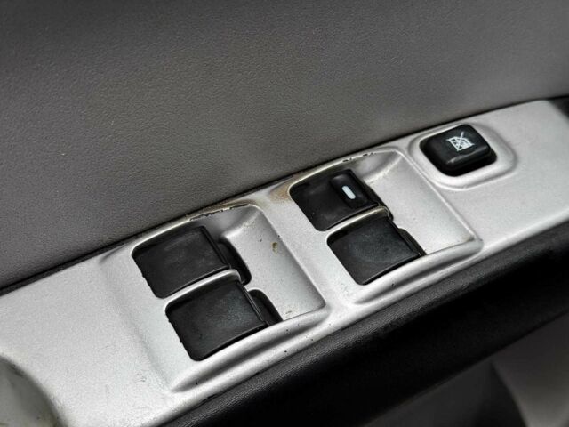 Чорний Міцубісі Л 200, об'ємом двигуна 2.5 л та пробігом 330 тис. км за 9890 $, фото 9 на Automoto.ua