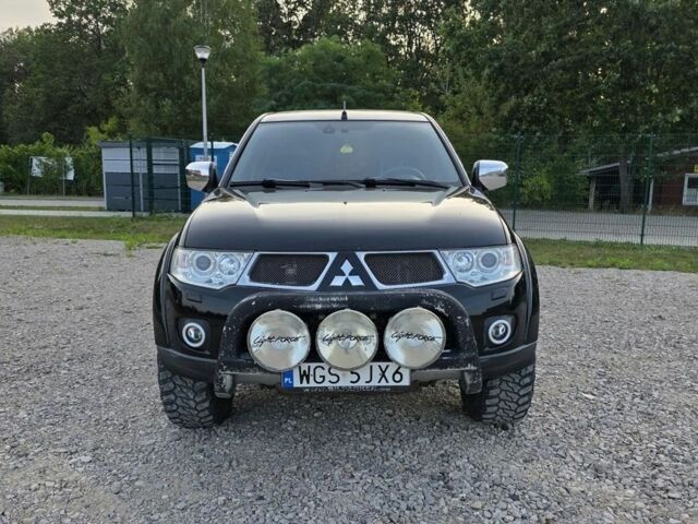 Черный Мицубиси Л 200, объемом двигателя 2.5 л и пробегом 213 тыс. км за 3006 $, фото 1 на Automoto.ua