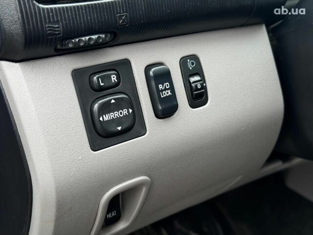 Чорний Міцубісі Л 200, об'ємом двигуна 2.5 л та пробігом 330 тис. км за 9890 $, фото 10 на Automoto.ua