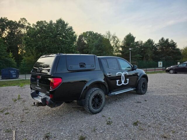 Черный Мицубиси Л 200, объемом двигателя 2.5 л и пробегом 213 тыс. км за 3006 $, фото 4 на Automoto.ua