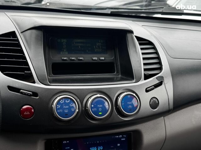 Чорний Міцубісі Л 200, об'ємом двигуна 2.5 л та пробігом 330 тис. км за 9890 $, фото 15 на Automoto.ua