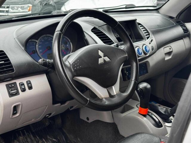 Чорний Міцубісі Л 200, об'ємом двигуна 2.5 л та пробігом 330 тис. км за 9890 $, фото 11 на Automoto.ua