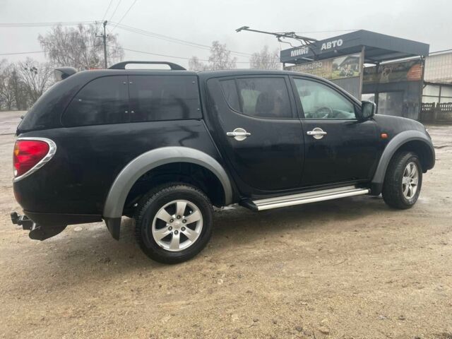 Черный Мицубиси Л 200, объемом двигателя 2.5 л и пробегом 145 тыс. км за 6800 $, фото 3 на Automoto.ua