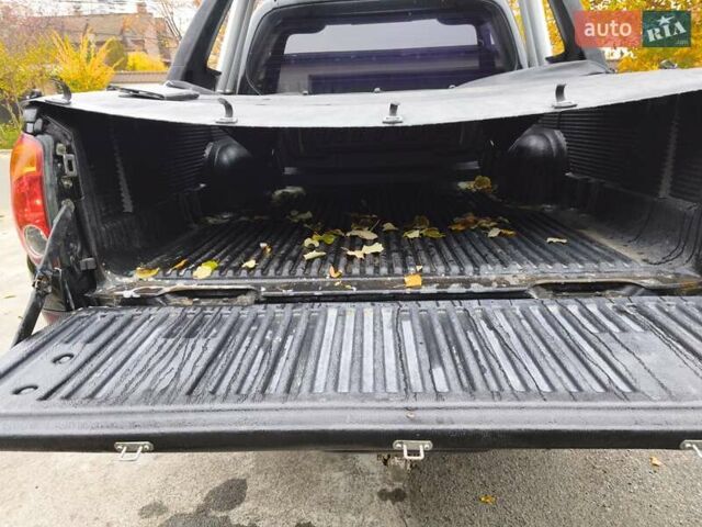 Черный Мицубиси Л 200, объемом двигателя 2.48 л и пробегом 260 тыс. км за 9500 $, фото 24 на Automoto.ua