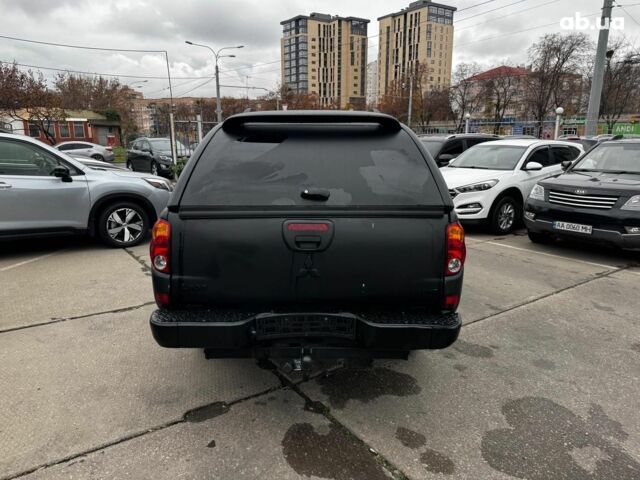 Чорний Міцубісі Л 200, об'ємом двигуна 2.5 л та пробігом 330 тис. км за 9890 $, фото 4 на Automoto.ua