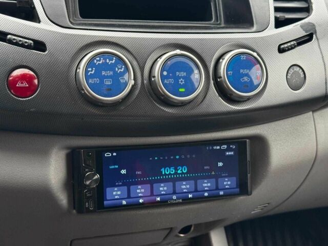 Чорний Міцубісі Л 200, об'ємом двигуна 2.5 л та пробігом 330 тис. км за 9890 $, фото 14 на Automoto.ua