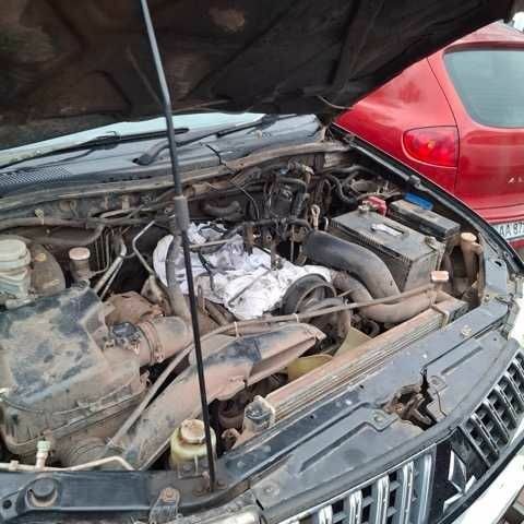 Чорний Міцубісі Л 200, об'ємом двигуна 2.5 л та пробігом 270 тис. км за 4500 $, фото 1 на Automoto.ua