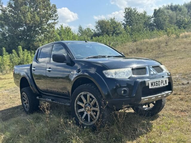 Чорний Міцубісі Л 200, об'ємом двигуна 2.5 л та пробігом 152 тис. км за 6500 $, фото 1 на Automoto.ua