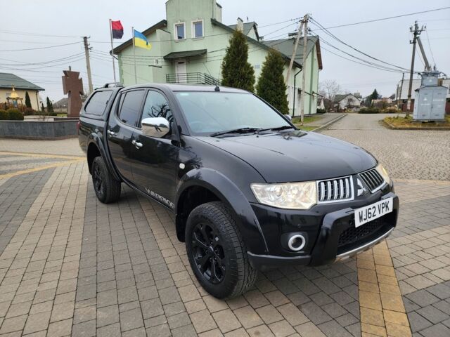 Черный Мицубиси Л 200, объемом двигателя 2.5 л и пробегом 114 тыс. км за 8748 $, фото 4 на Automoto.ua