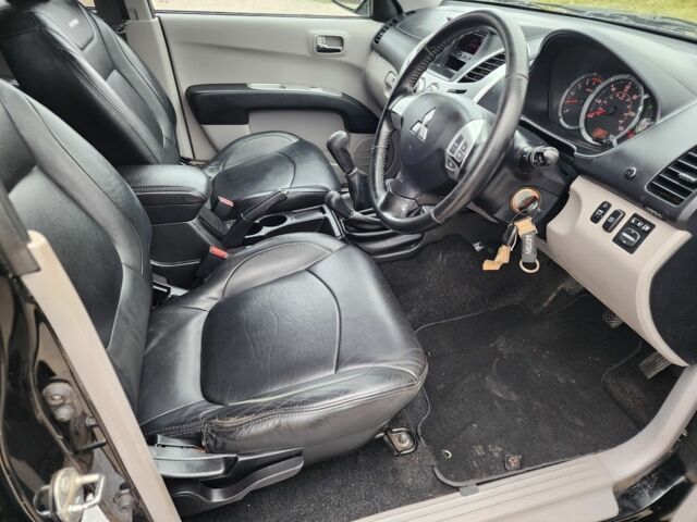 Черный Мицубиси Л 200, объемом двигателя 2.5 л и пробегом 114 тыс. км за 8748 $, фото 14 на Automoto.ua