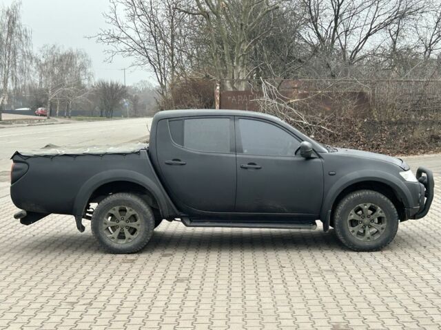 Чорний Міцубісі Л 200, об'ємом двигуна 2.5 л та пробігом 128 тис. км за 5650 $, фото 1 на Automoto.ua