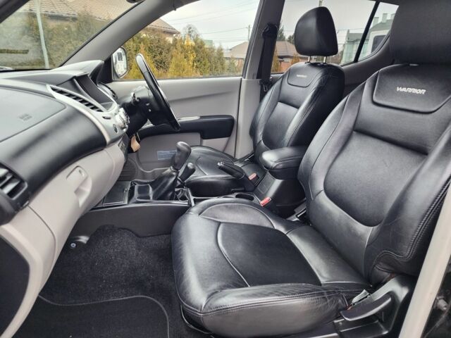 Черный Мицубиси Л 200, объемом двигателя 2.5 л и пробегом 114 тыс. км за 8748 $, фото 18 на Automoto.ua