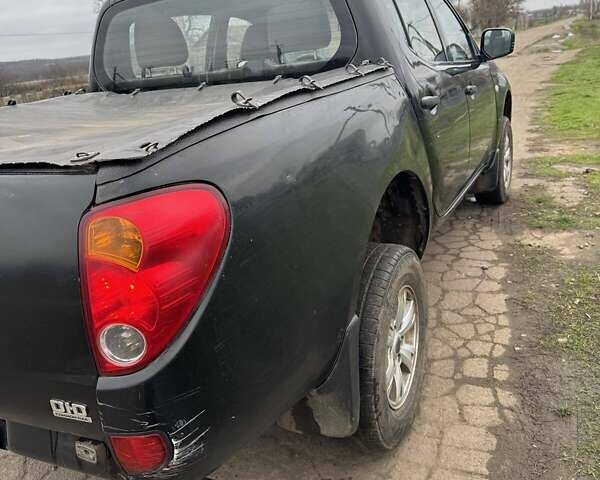 Черный Мицубиси Л 200, объемом двигателя 2.48 л и пробегом 295 тыс. км за 14800 $, фото 21 на Automoto.ua