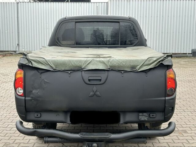 Чорний Міцубісі Л 200, об'ємом двигуна 2.5 л та пробігом 128 тис. км за 5650 $, фото 3 на Automoto.ua