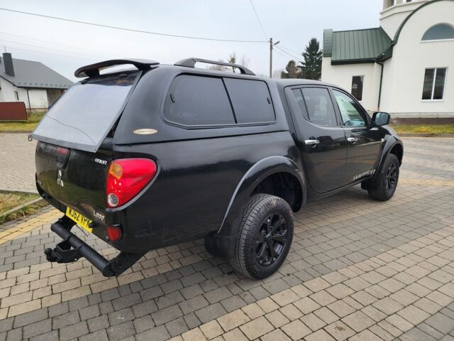 Черный Мицубиси Л 200, объемом двигателя 2.5 л и пробегом 114 тыс. км за 8748 $, фото 12 на Automoto.ua