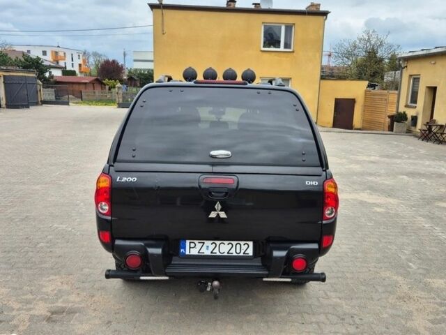Чорний Міцубісі Л 200, об'ємом двигуна 2.5 л та пробігом 218 тис. км за 4974 $, фото 4 на Automoto.ua