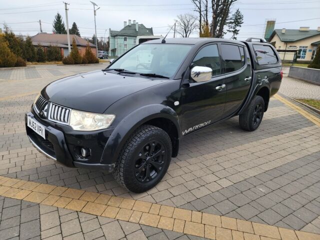 Черный Мицубиси Л 200, объемом двигателя 2.5 л и пробегом 114 тыс. км за 8748 $, фото 7 на Automoto.ua