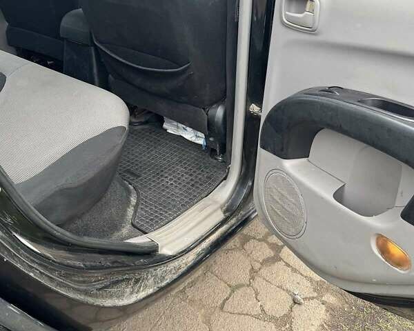 Черный Мицубиси Л 200, объемом двигателя 2.48 л и пробегом 295 тыс. км за 14800 $, фото 12 на Automoto.ua
