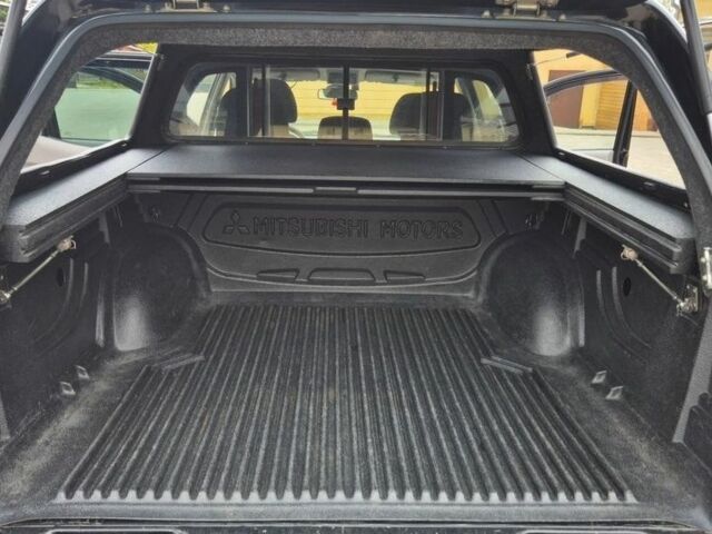 Чорний Міцубісі Л 200, об'ємом двигуна 2.5 л та пробігом 218 тис. км за 4974 $, фото 5 на Automoto.ua