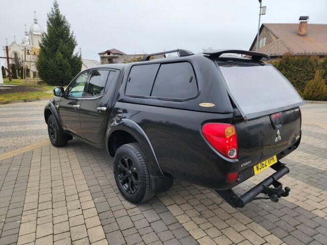 Черный Мицубиси Л 200, объемом двигателя 2.5 л и пробегом 114 тыс. км за 8748 $, фото 8 на Automoto.ua