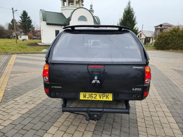 Черный Мицубиси Л 200, объемом двигателя 2.5 л и пробегом 114 тыс. км за 8748 $, фото 10 на Automoto.ua