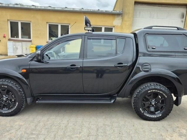 Чорний Міцубісі Л 200, об'ємом двигуна 2.5 л та пробігом 218 тис. км за 4974 $, фото 1 на Automoto.ua