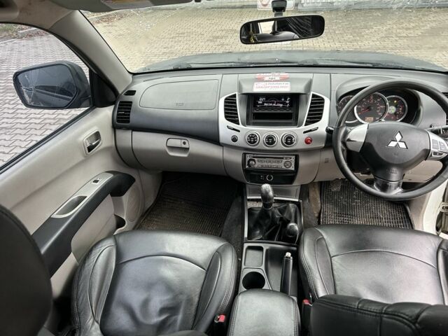 Чорний Міцубісі Л 200, об'ємом двигуна 2.5 л та пробігом 128 тис. км за 5650 $, фото 10 на Automoto.ua