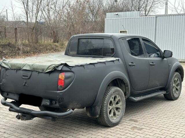 Чорний Міцубісі Л 200, об'ємом двигуна 2.5 л та пробігом 128 тис. км за 5650 $, фото 2 на Automoto.ua