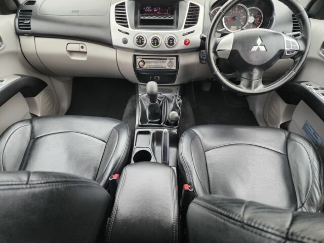 Черный Мицубиси Л 200, объемом двигателя 2.5 л и пробегом 114 тыс. км за 8748 $, фото 21 на Automoto.ua